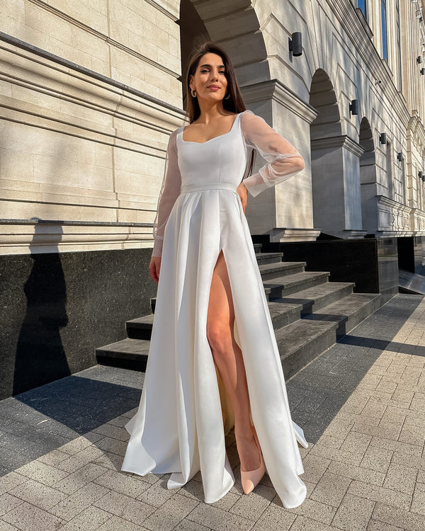 Elegant long white satin wedding dress with slit