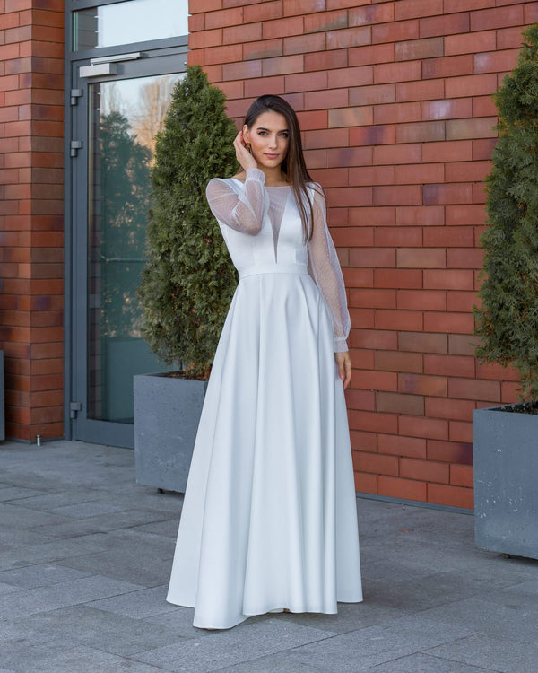 Long A-line wedding dress with neckline and long sleeves